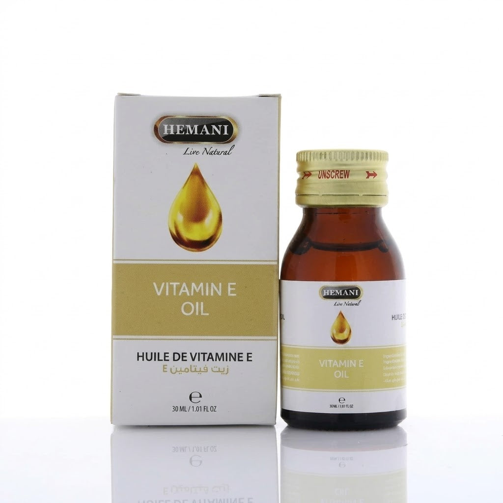 Hemani Vitamin E oil bottle and box on a white background