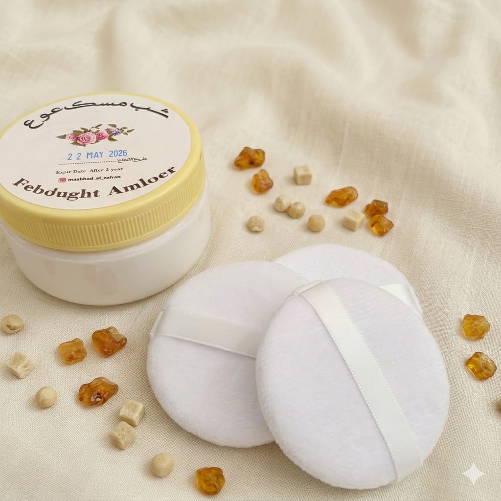 Jar of Shabah Powder with three Sponges on a beige fabric background