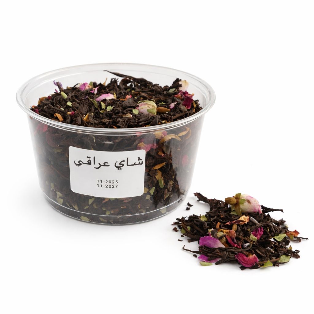 Clear container with dried tea leaves and a label on a white background