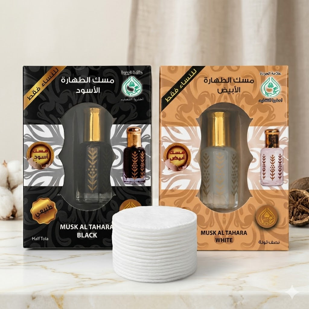 Two boxes of Musk Al Tahara Black and White on a marble surface with a neutral background.