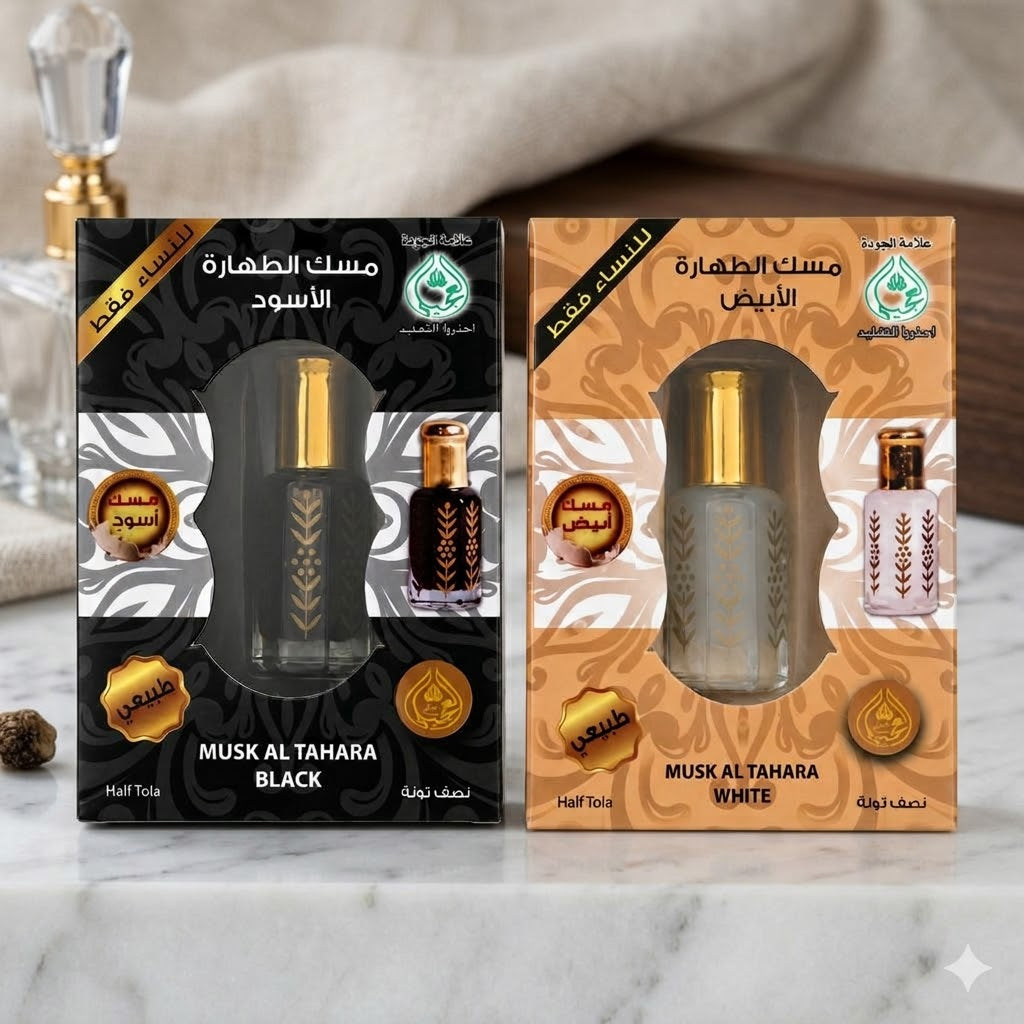 Two boxes of Musk Al Tahara Black and White on a marble surface.
