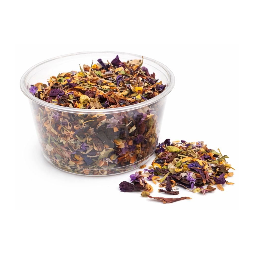 Clear container filled with Relaxing Tea and herbs on a white background