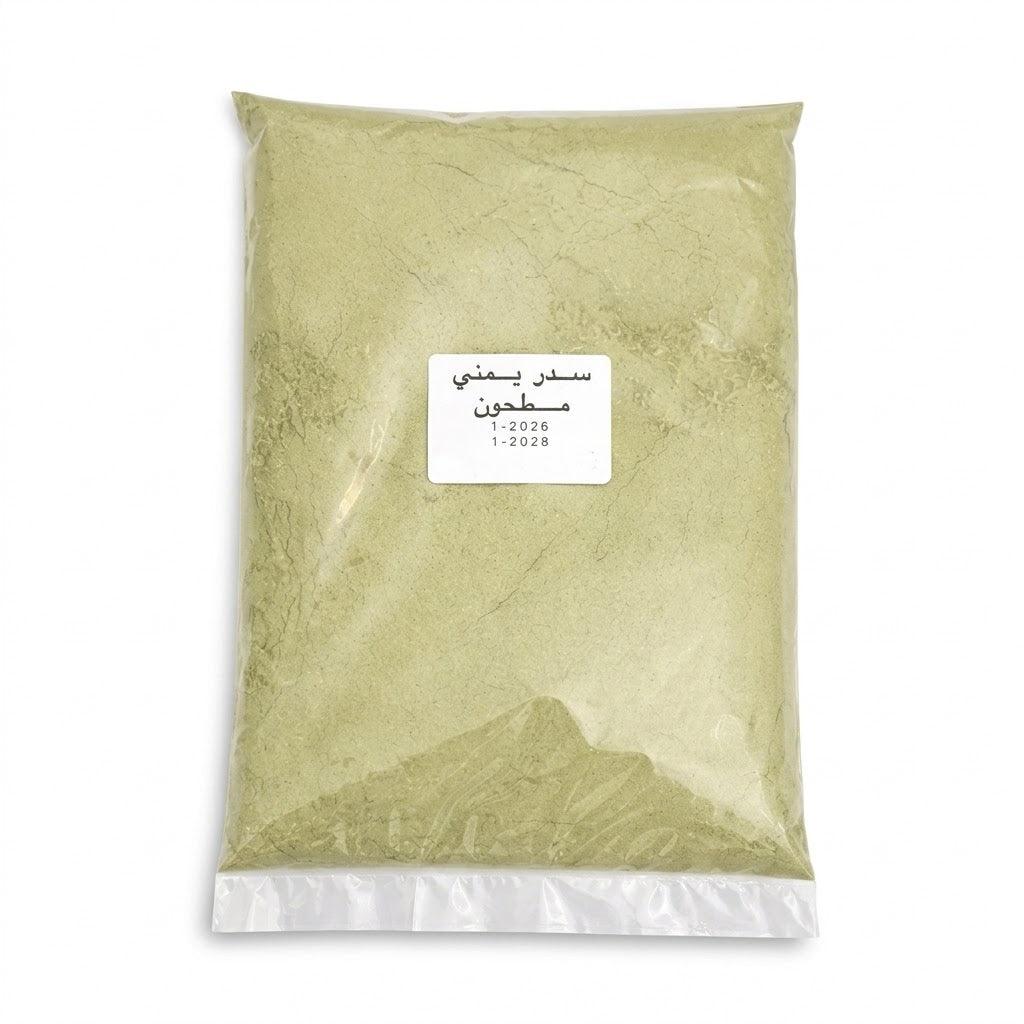 Green Sidr powder in a clear plastic bag with a label on a white background